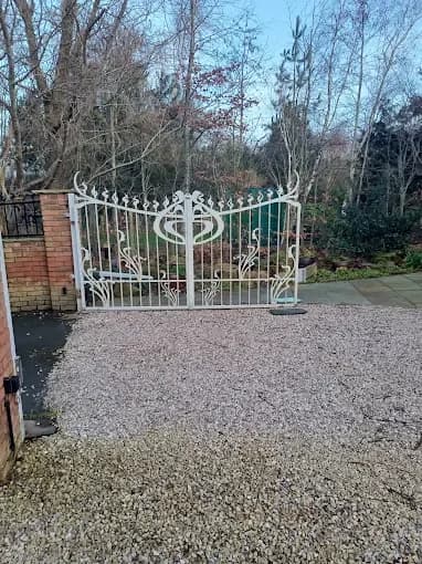 Ornate wrought-iron estate gate installed by John the Gate Man, Lancashire